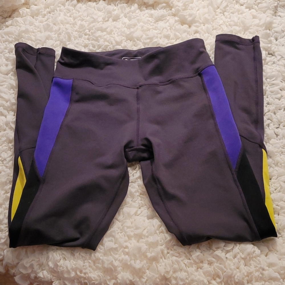 Nikibiki - size small leggings - dark gray w/ purple & yellow accents